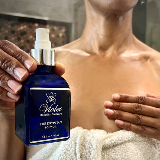 Body Oil The Egyptian Marula 3.4 fl oz woman holding